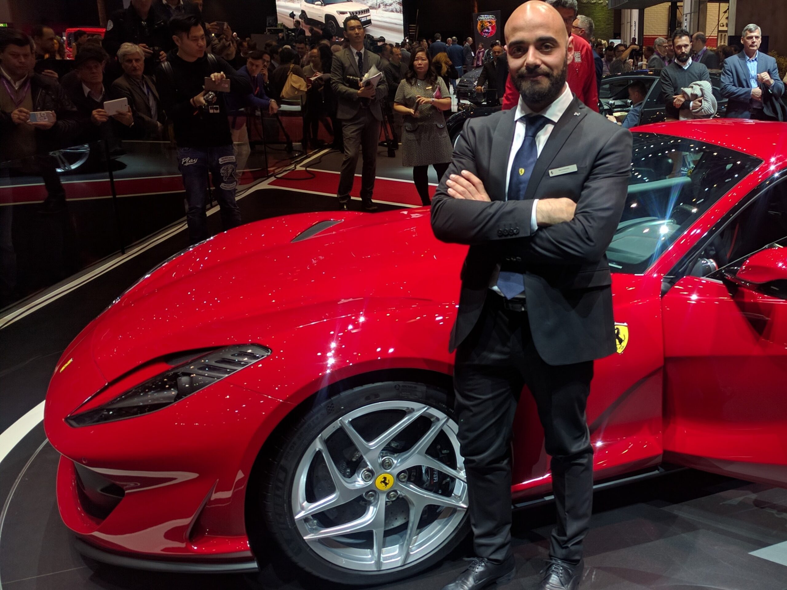 Marco Iannitto at the Geneva Motor Show with a Ferrari